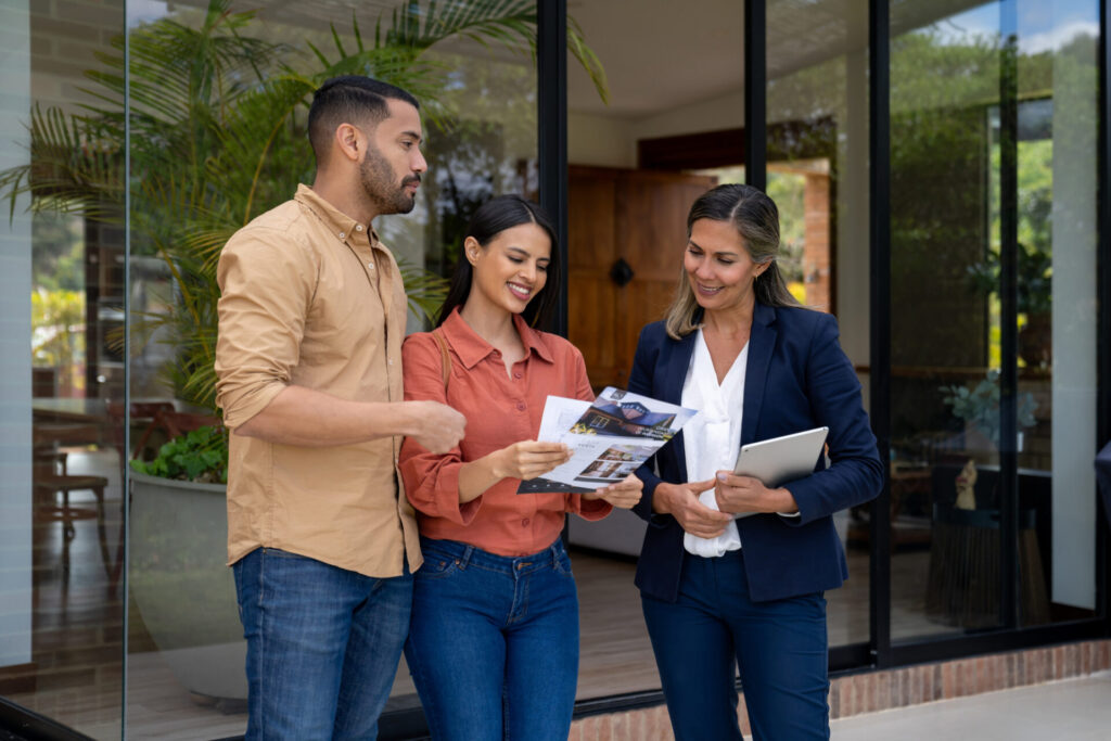 couple talking to estate agent